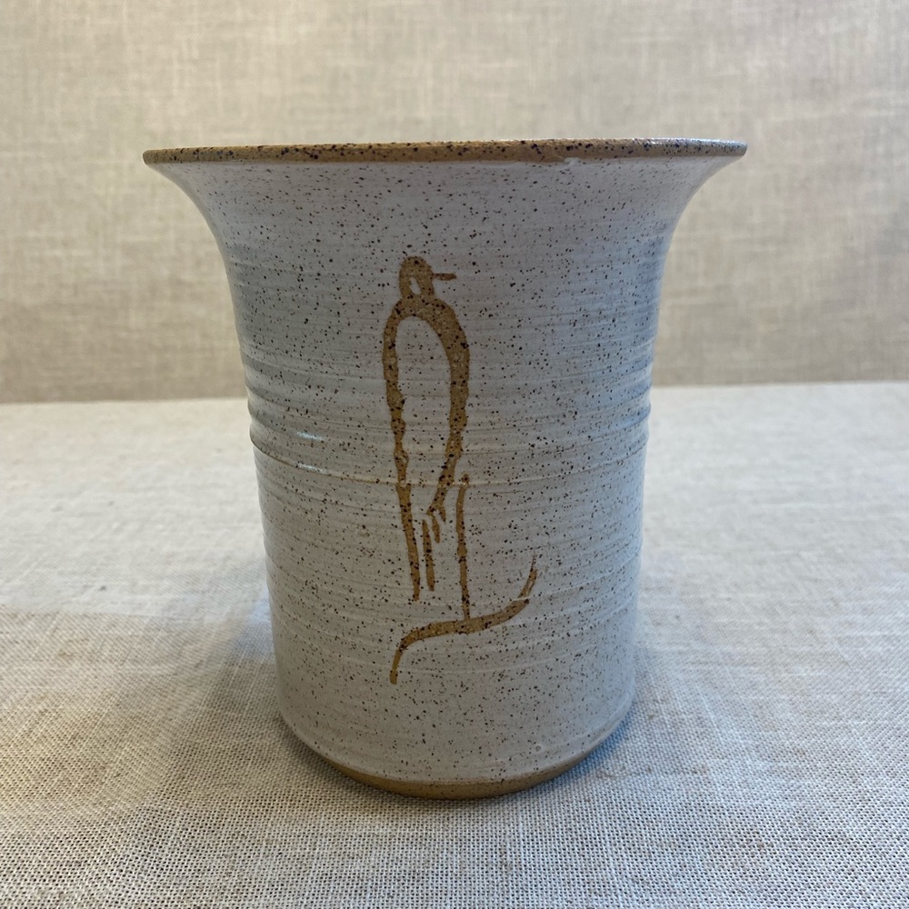 Signed stoneware penguin pattern canister/vase.
